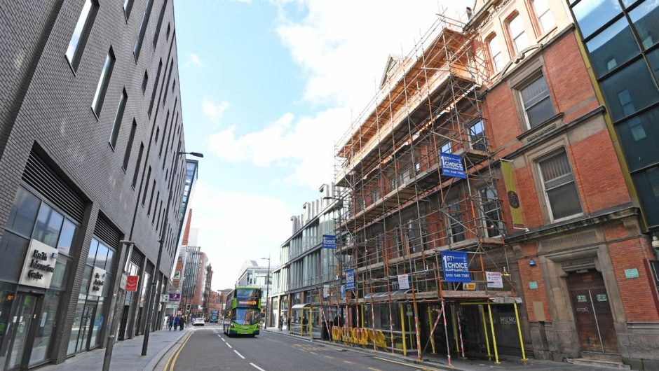 A 15-year-old boy died after falling from a parking lot in Liverpool