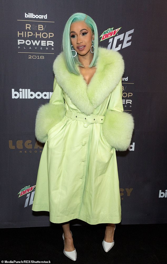 Green Acid: Cardi B was also rocking a version of the coat in 2018