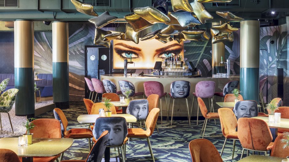 Cinema and Surrealism dominate the interiors of this club